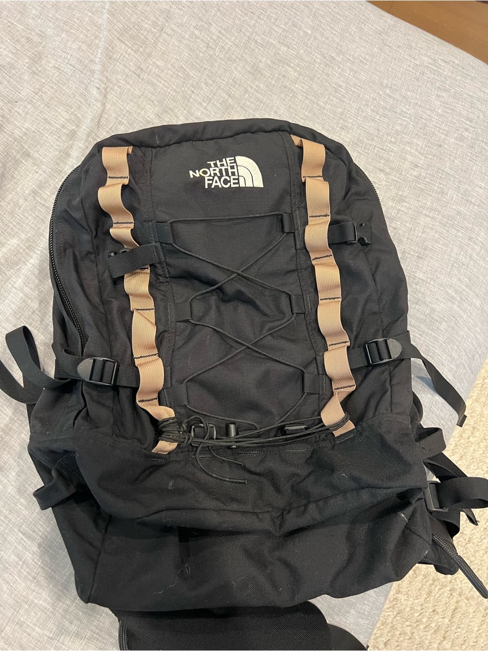 The North Face Black Backpack with Tan Webbing and Bungee